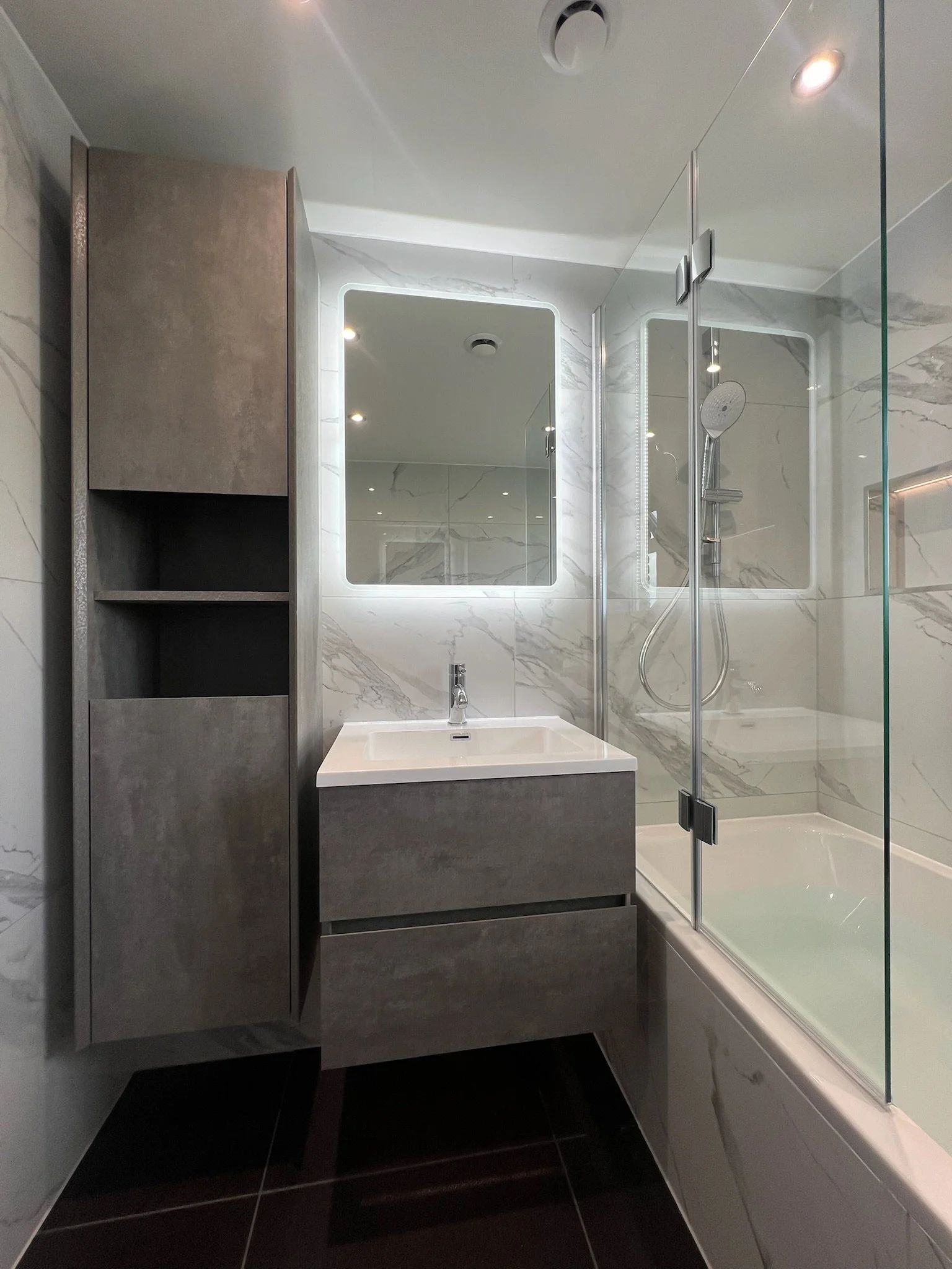 Bathroom with walk-in shower cleaned