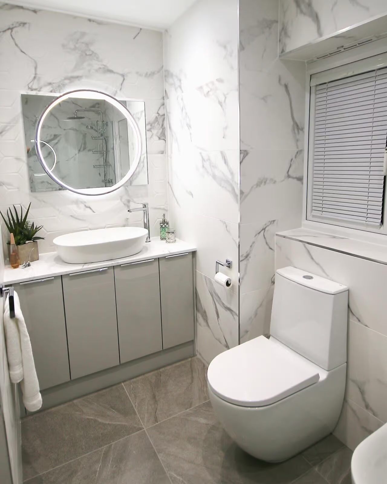 Bathroom with rustic wood vanity cleaned